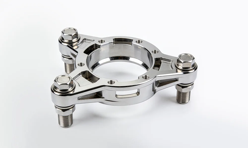 Polished rapid prototype metal component with fasteners